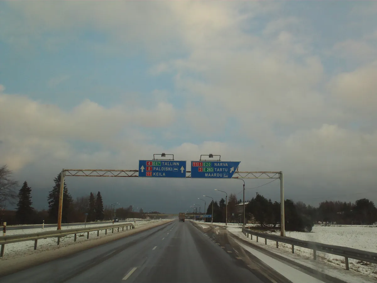 Junction signs for Tallinn, Narva and Tartu on Estonian highway 4, where the E67 corridor from Germany ends