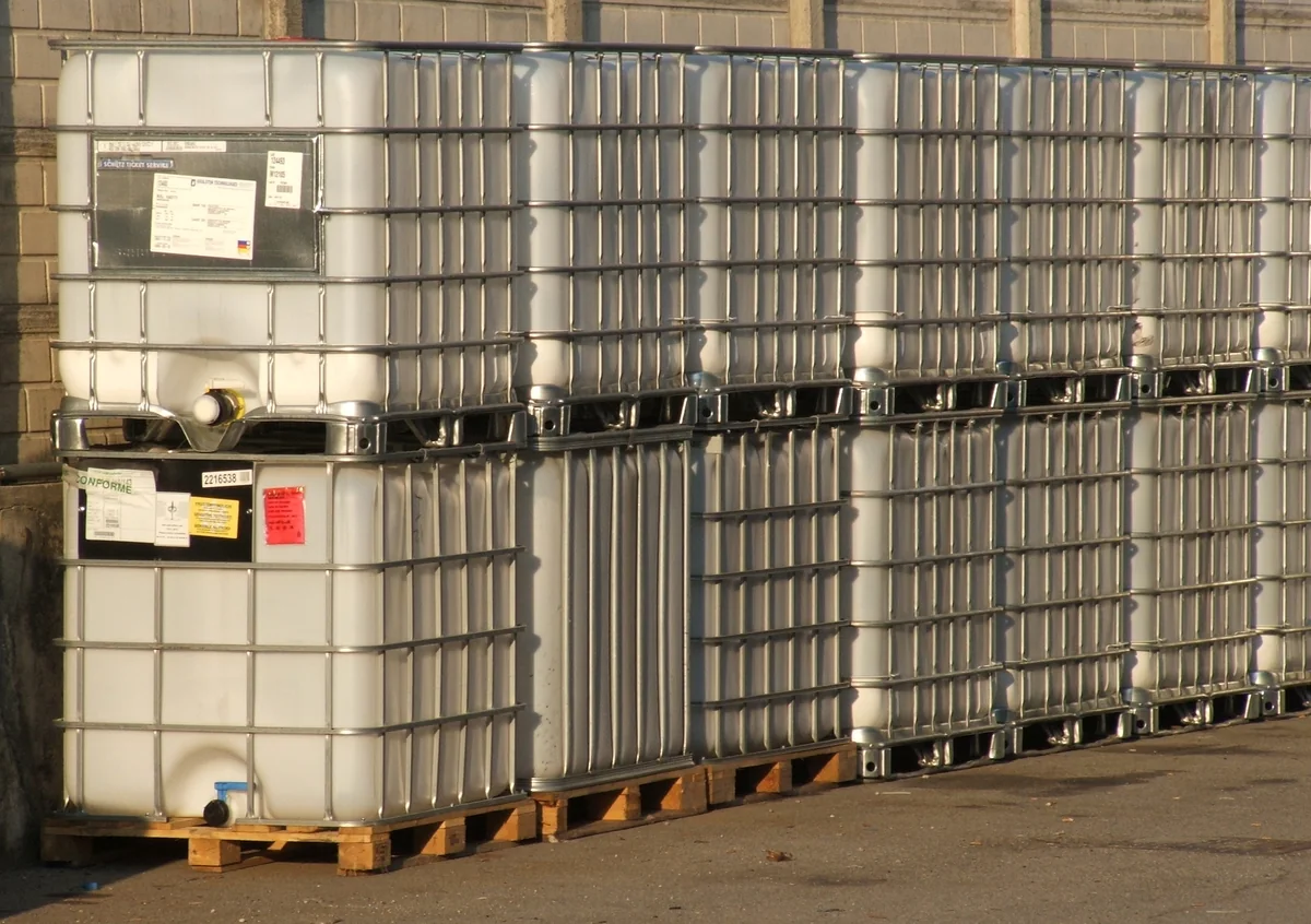 Intermediate bulk containers stacked two high on pallets, the packed alternative to one tanker of product