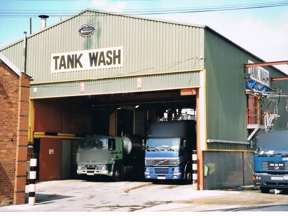 Road tankers in the bays of a tank wash station, where a tank is cleaned before its next load
