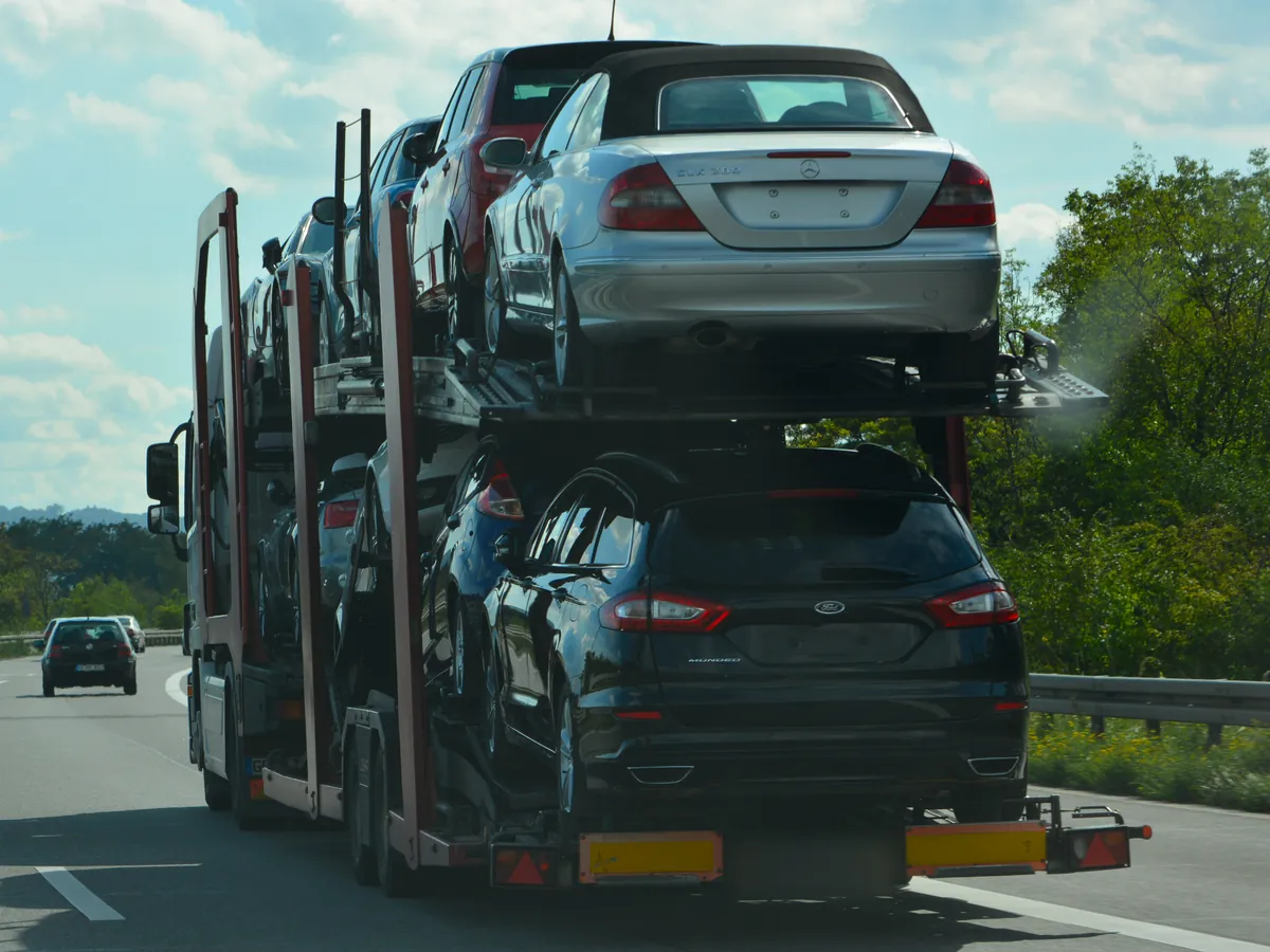 Loaded two deck car transporter on a German autobahn near Darmstadt
